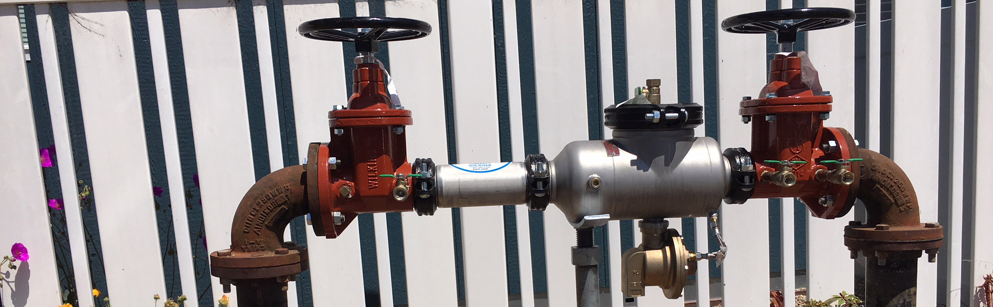 Backflow control valves above ground